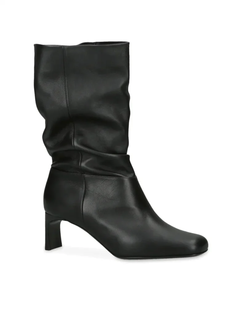 Black leather slouch boot with block heel, footwear retouching
